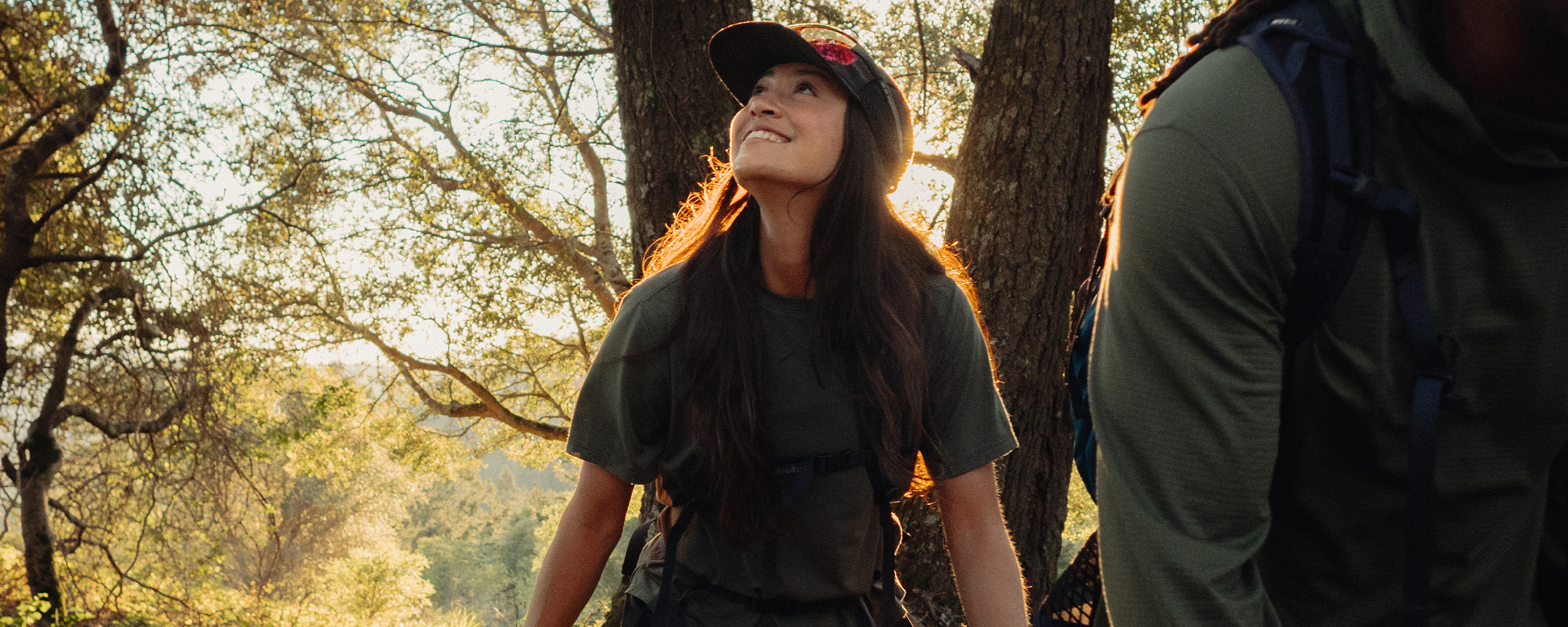Woman hiking wearing Outdoor Research sportswear. 