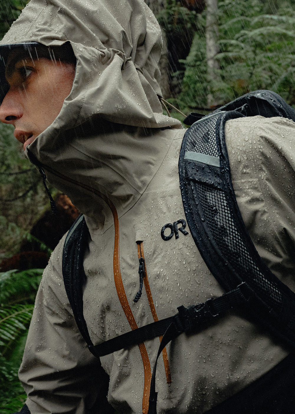 Female walking with two others wearing Outdoor Research Women's Aspire 3L Jacket Mallard. 