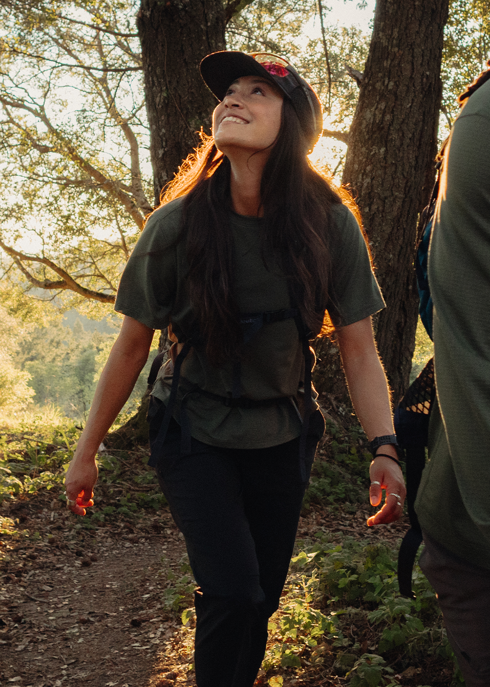 Woman hiking wearing Outdoor Research sportswear. 