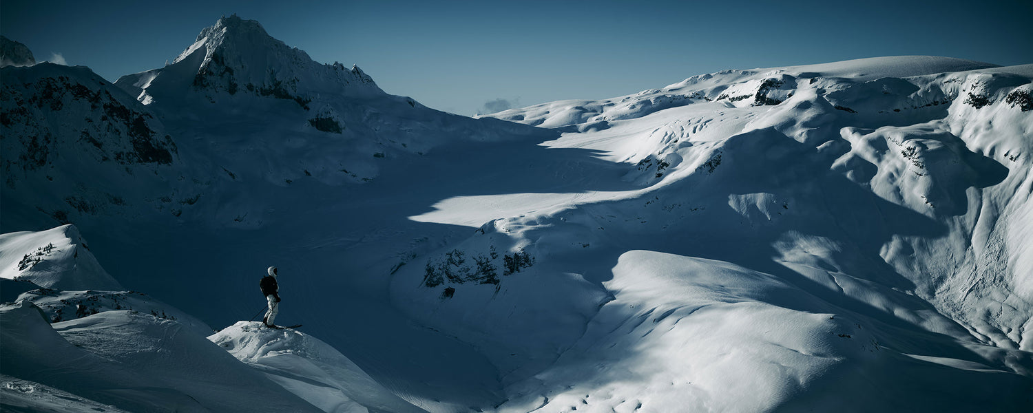 Outdoor Research Ski Athlete Mark Abma surveys the snowy terrain in front of him.